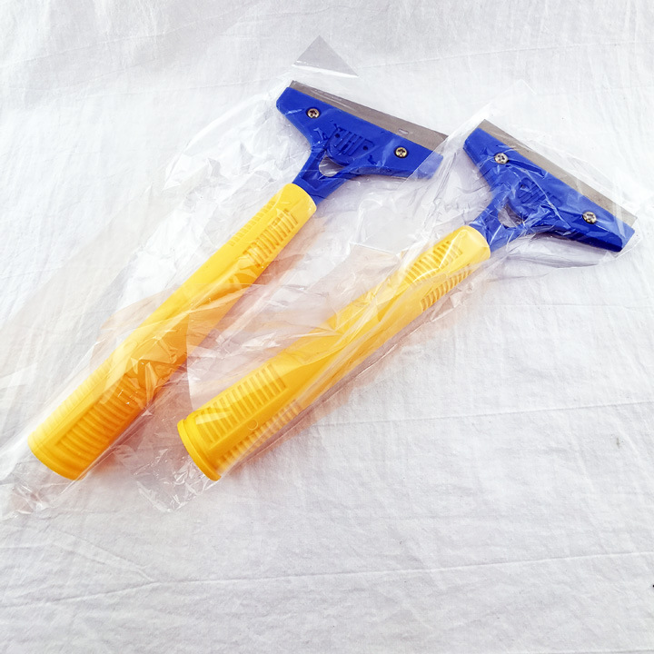 D1244 amarillo mango de limpieza pala piedra cuchillo pared piel vidrio cerámica raspador goma Yiwu 2 yuanes tienda