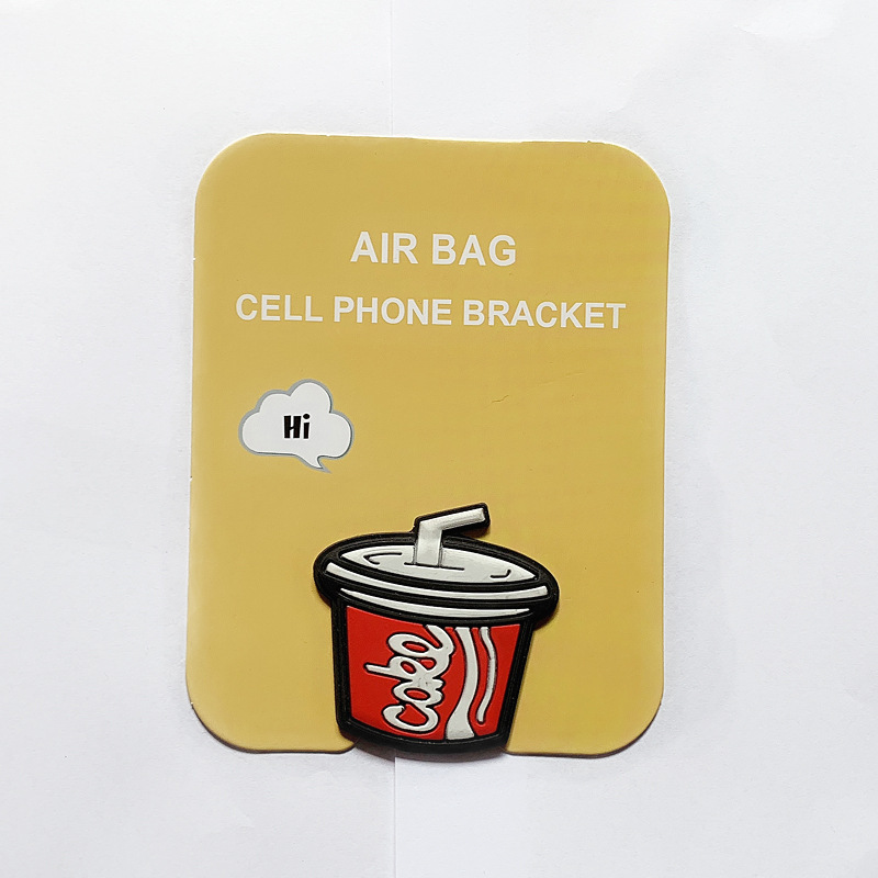 En stock al por mayor TikTok Cartoon creativo soporte de teléfono móvil puede soportar airbag soporte de teléfono móvil soporte de escritorio