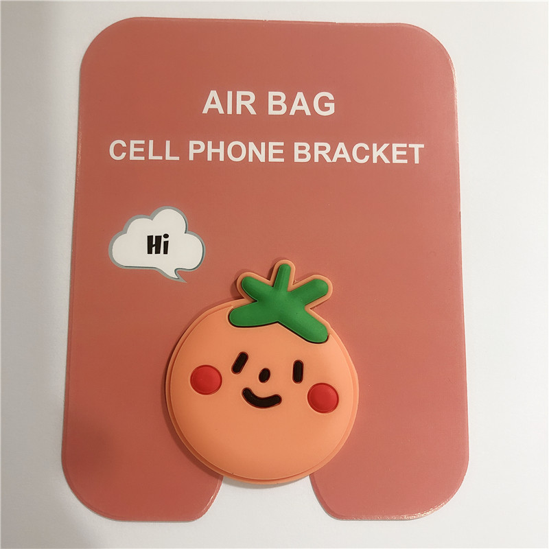 En stock al por mayor TikTok Cartoon creativo soporte de teléfono móvil puede soportar airbag soporte de teléfono móvil soporte de escritorio