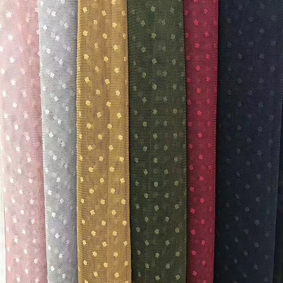Suministro directo de fábrica poliéster no elástico jacquard malla tridimensional pequeño punto tela de encaje multicolor en stock al por mayor textil
