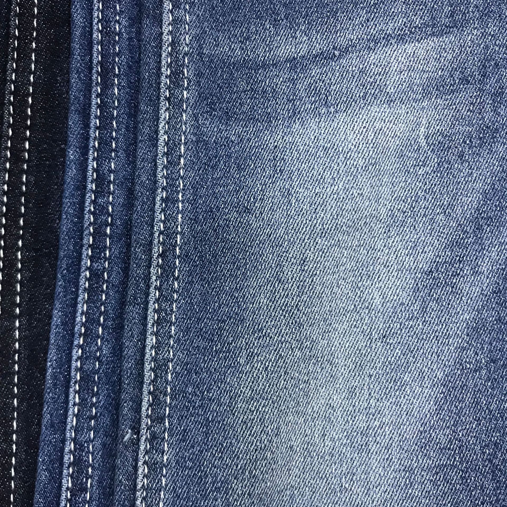 Moda tejido elástico de tela de mezclilla 10 piezas de Dios teñido elástico inferior doble Bud núcleo pura sarga Denim ventas directas de la fábrica
