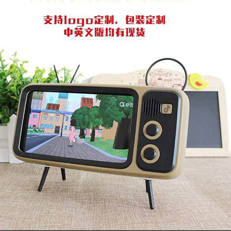 Soporte de teléfono móvil transfronterizo escritorio retro TV Bluetooth audio teléfono móvil multifunción TV soporte perezoso juego persiguiendo artefacto