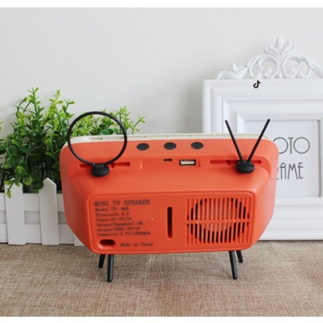 Soporte de teléfono móvil transfronterizo escritorio retro TV Bluetooth audio teléfono móvil multifunción TV soporte perezoso juego persiguiendo artefacto