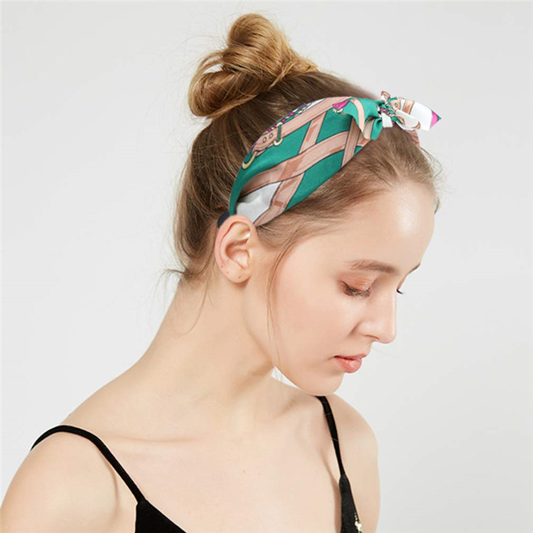 Accesorios para el cabello con estampado de leopardo Orejas de conejo anudadas versión ancha diadema hembra europea y americana placa horquilla diadema joyería al por mayor de tres Estados