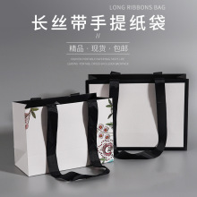 现货服装包装手提纸袋彩印logo 企业宣传广告纸袋 商场购物礼品袋