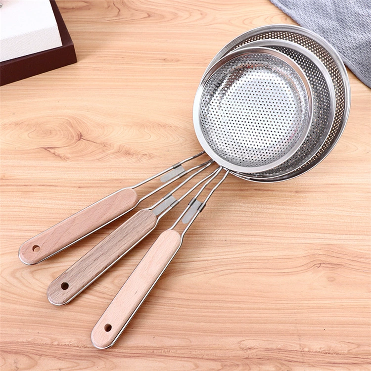 Stainless steel filter spoon multi -function wooden handle oil grid fried large -gum -gum -gum kitchen tool manufacturer approves network leakage