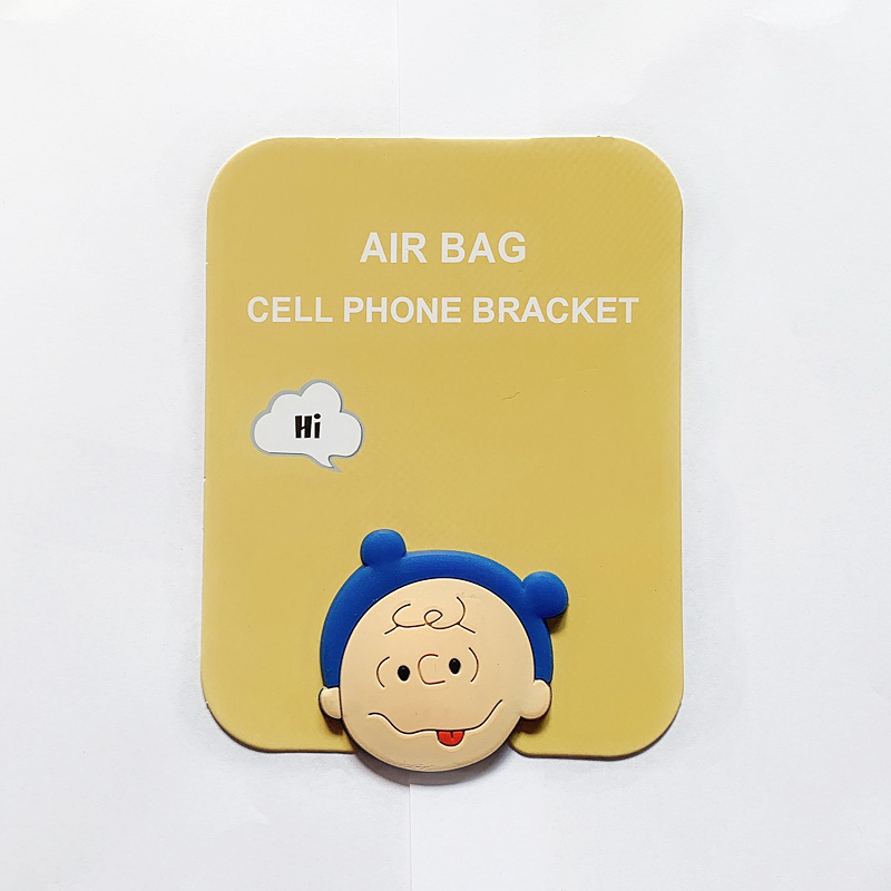 En stock al por mayor TikTok Cartoon creativo soporte de teléfono móvil puede soportar airbag soporte de teléfono móvil soporte de escritorio