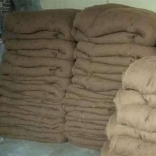 现货供应丝光驼绒絮片针刺絮片被褥被胎服装填充物
