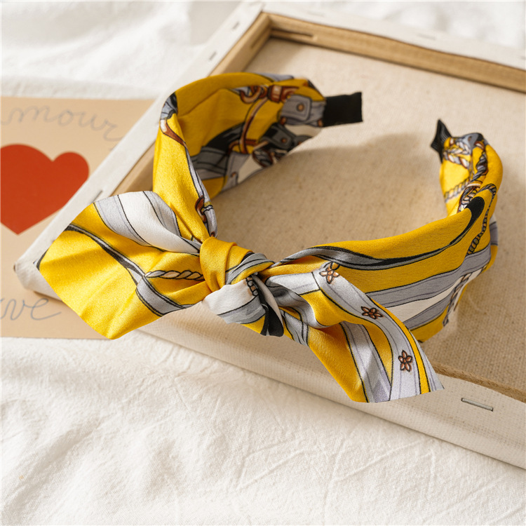 Diadema de oreja de conejo amarillo de cadena