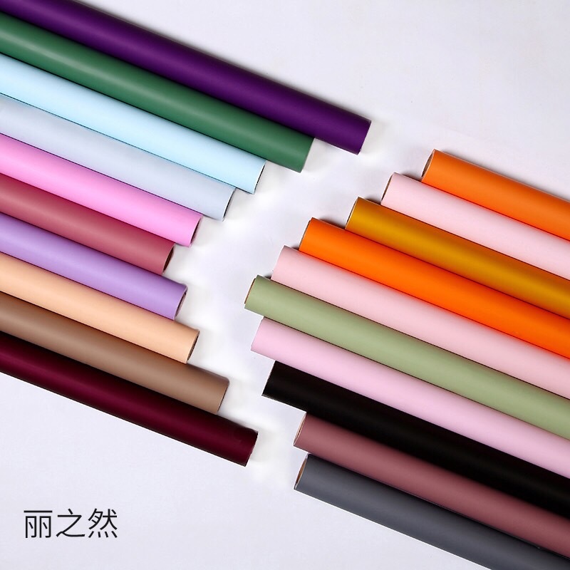 Lizhi Ran grueso bicolor impermeable Ouya papel embalaje de flores al por mayor color caramelo Hanfei papel 56cm rollo de doble cara