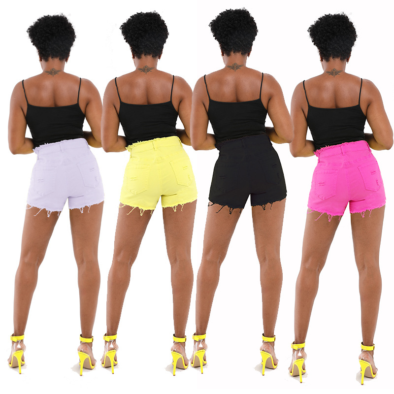 2023 primavera nuevo en stock al por mayor americano Amazon primavera y verano nuevo botón borla borde ropa de mujer Pantalones cortos de mezclilla