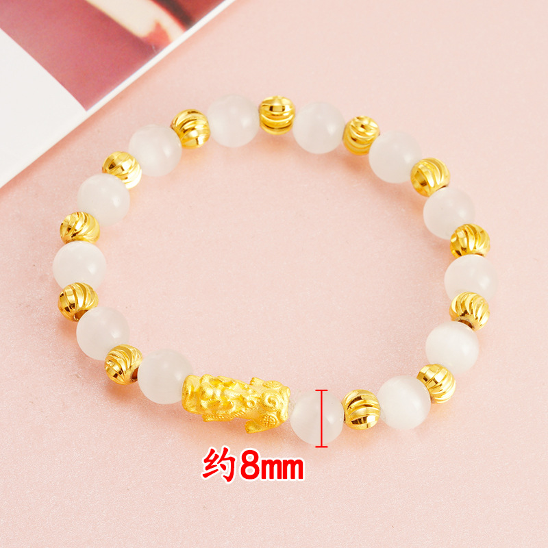 Venta al por mayor 8N imitación de piedra de ojo de gato 24k pulsera única de oro pulsera de mujer imitación granate en línea transmisión en vivo pulsera de arena