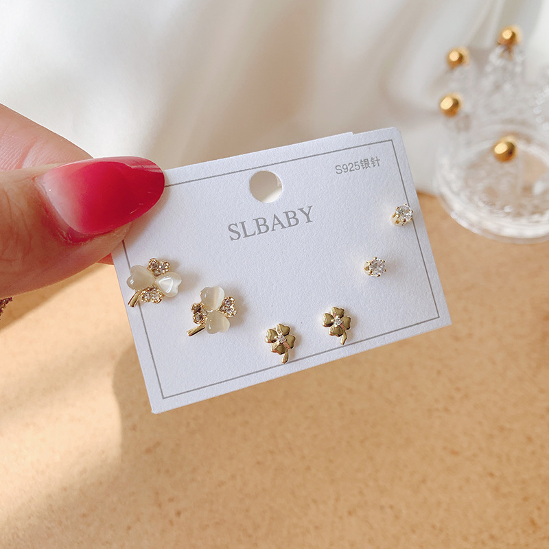 S925 aguja de plata micro incrustaciones de circón pendientes cortos pendientes de pelo corto japonés y coreano elegante todo-fósforo simple conjunto de tres piezas pendientes para las mujeres