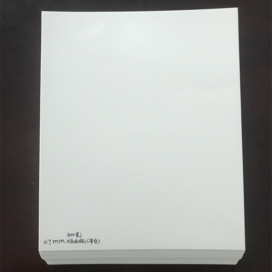 我司长期供应400克0.7MM本白高档杯垫专用吸水纸