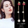 Long universal asymmetrical earrings from pearl with tassels, bright catchy style