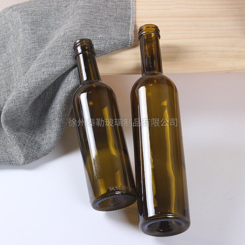 厂家供应500ml丝口红酒瓶空瓶玻璃酒瓶酒柜装饰墨绿色一斤洋酒瓶
