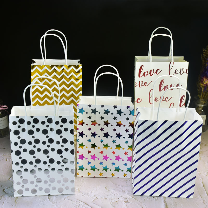 现货烫金礼品袋手提圆点纸袋白牛皮服装手提纸袋