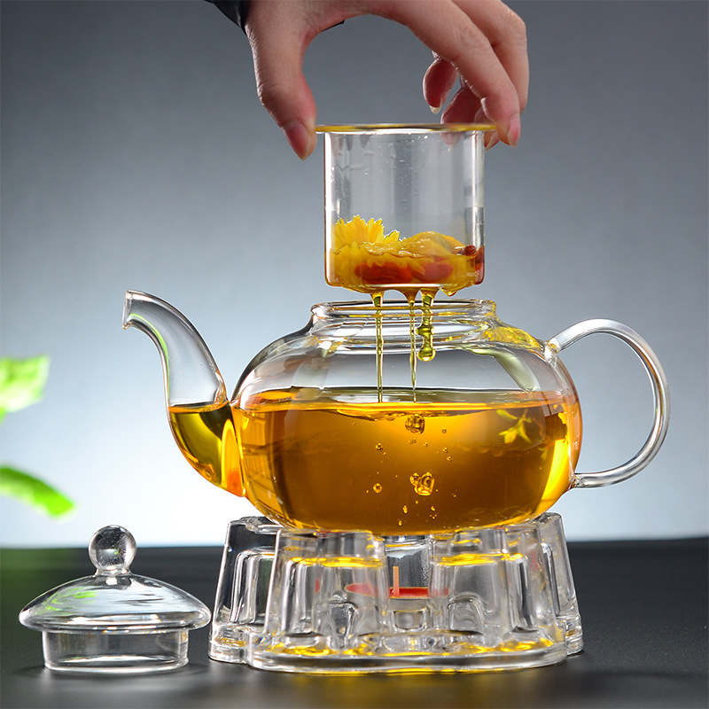 Los fabricantes suministran cuatro estaciones tetera de vidrio borosilicato tetera transparente Kung Fu juego de té traje