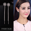 Long universal asymmetrical earrings from pearl with tassels, bright catchy style