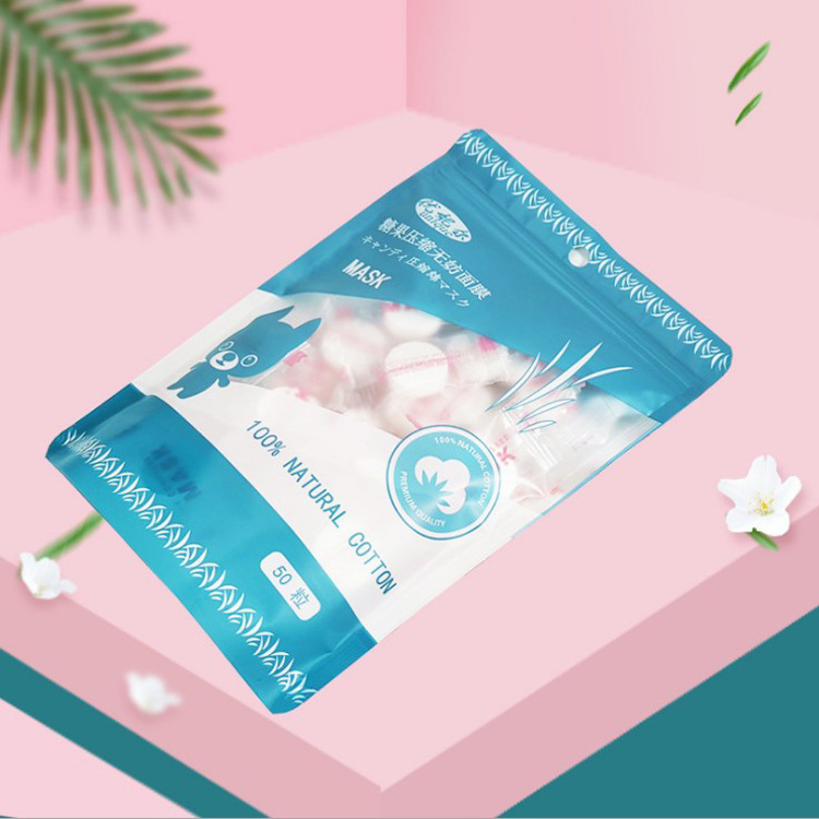 Productos domésticos rompecabezas máscara comprimida papel desechable tela no tejida 50 piezas paquete comprimido máscara de grano Tencel al por mayor image 5
