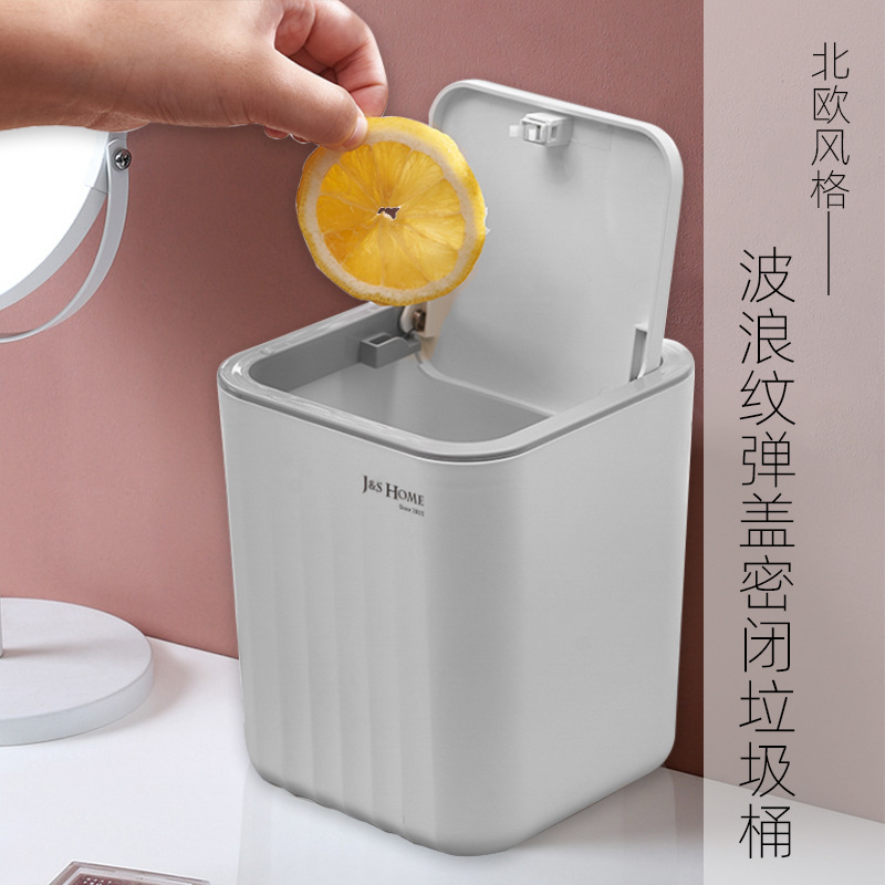 Escritorio Mini bote de basura de plástico coche creativo baño lavado y tocador Prensa bote de basura con tapa