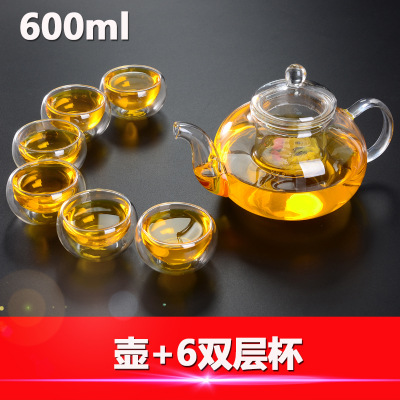 Los fabricantes suministran cuatro estaciones tetera de vidrio borosilicato tetera transparente Kung Fu juego de té traje