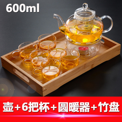 Los fabricantes suministran cuatro estaciones tetera de vidrio borosilicato tetera transparente Kung Fu juego de té traje