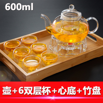 Los fabricantes suministran cuatro estaciones tetera de vidrio borosilicato tetera transparente Kung Fu juego de té traje
