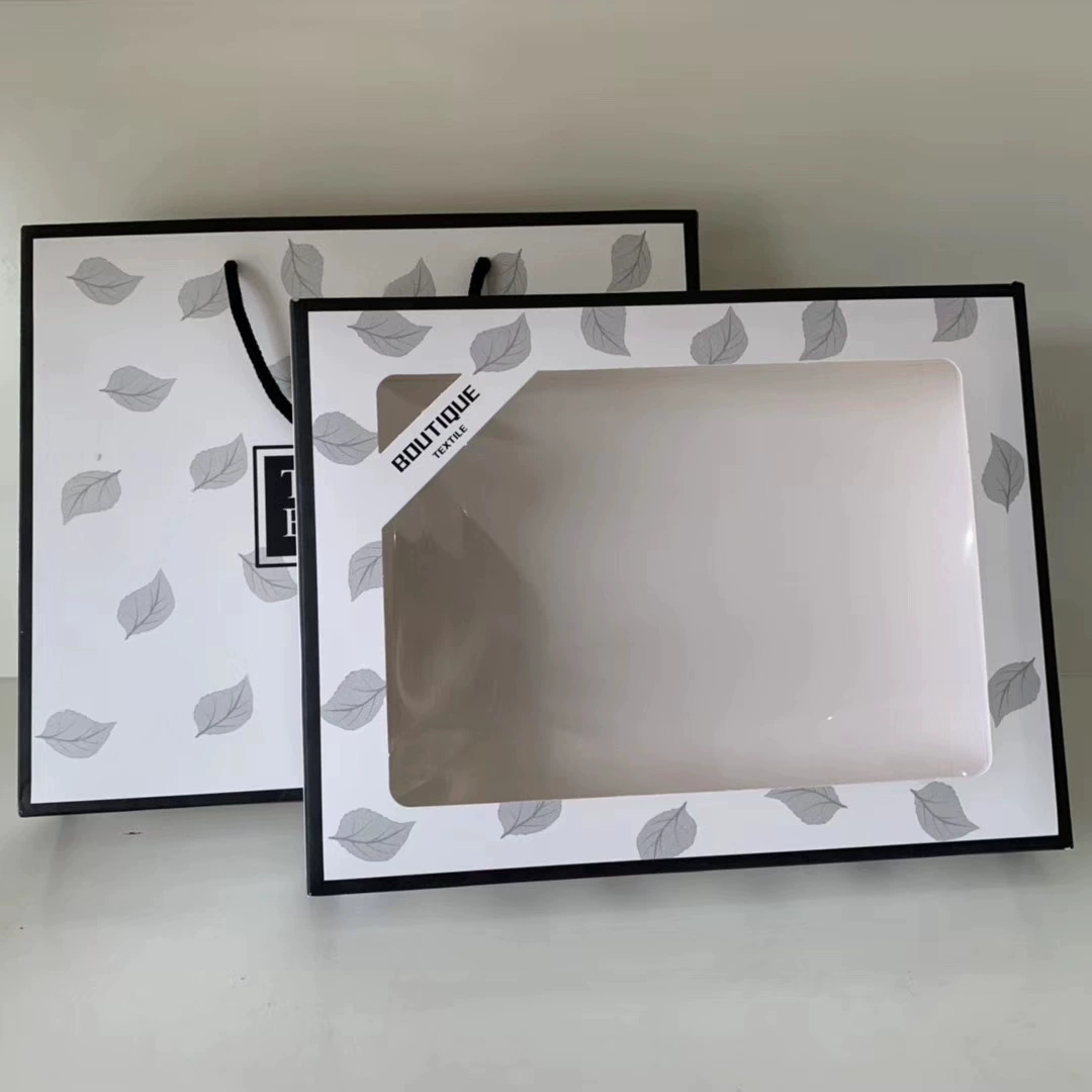 Подарочный набор из двух полотенец с дизайном в виде листьев, элегантный и стильный, в подарочной коробке с крышкой.