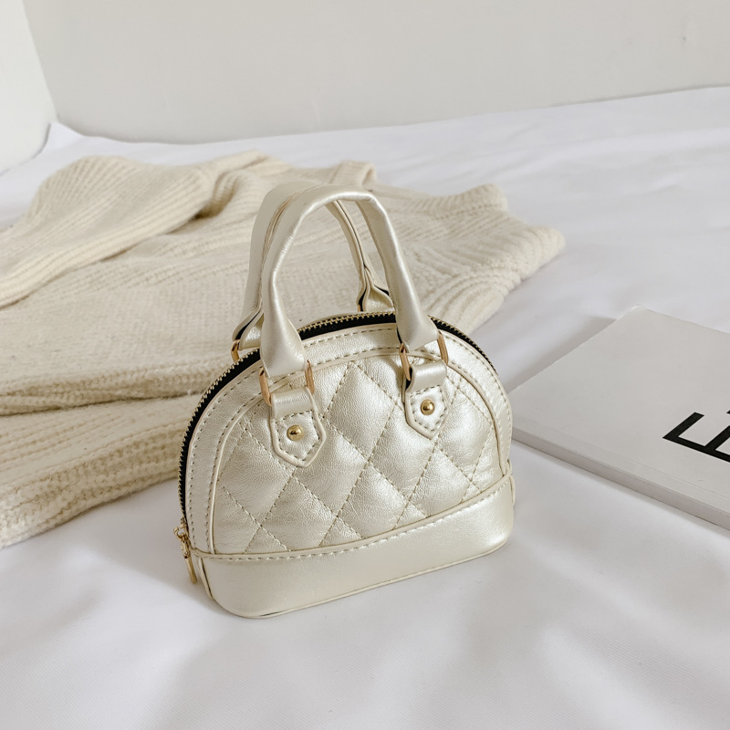 Bolso para niños de estilo coreano 2021 otoño e invierno nuevo bolso de hombro lindo rombo mini bolso de concha de moda bolso de accesorios crossbody