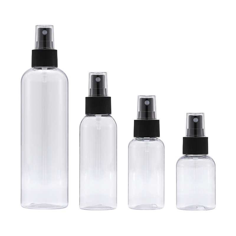 Xumin material de embalaje en stock botella de spray de plástico PET transparente redondo hombro negro pequeña cubierta pura botella de rocío Xumin material de embalaje