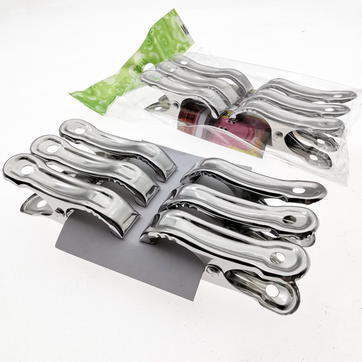 L2342 5cm paquete de seis pequeño edredón clip a prueba de viento clip percha pantalones clip secado calcetines clip Yiwu 2 yuanes tienda al por mayor