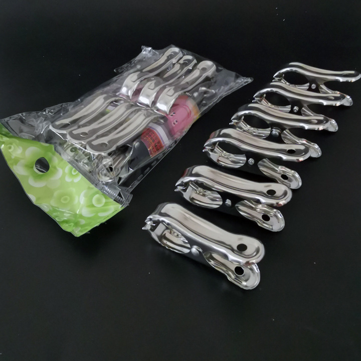 L2342 5cm paquete de seis pequeño edredón clip a prueba de viento clip percha pantalones clip secado calcetines clip Yiwu 2 yuanes tienda al por mayor