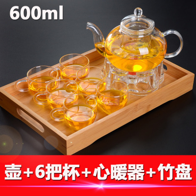 Los fabricantes suministran cuatro estaciones tetera de vidrio borosilicato tetera transparente Kung Fu juego de té traje