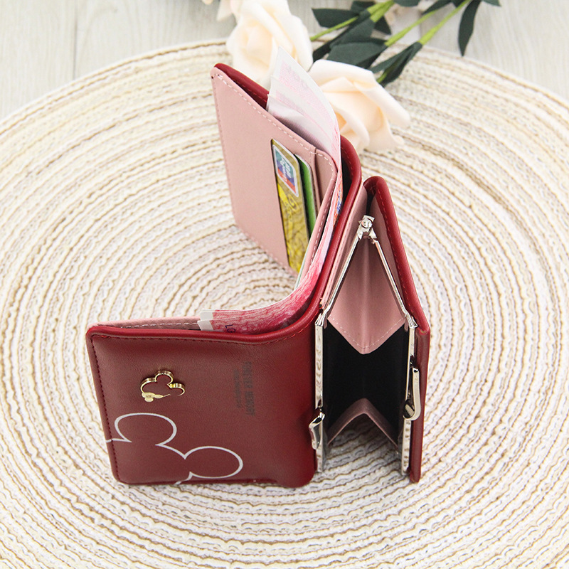 新商品の女の子の財布はカジュアルで可愛いです。学生の小銭入れは韓国版の女性の短い財布です。