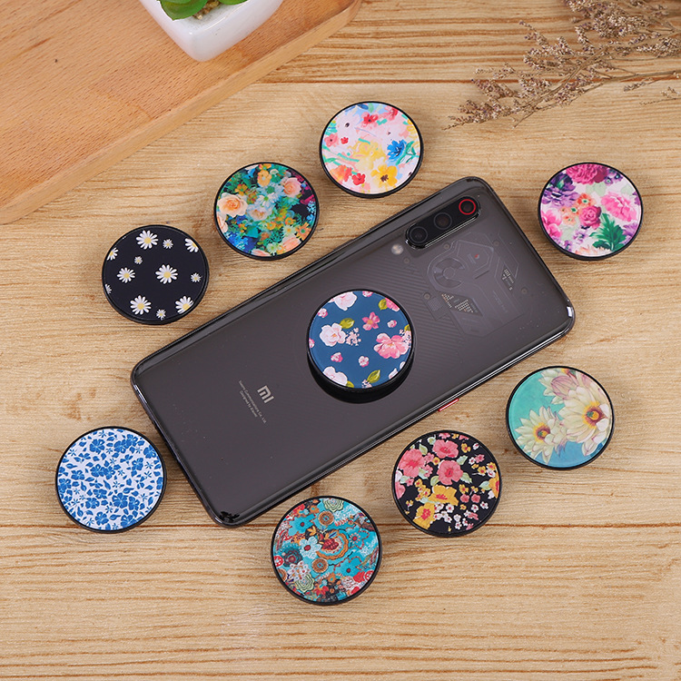 Flower type lazy person bracket mobile phone lazy person airbag bracket telescopic bracket acrylic cartoon LOGO