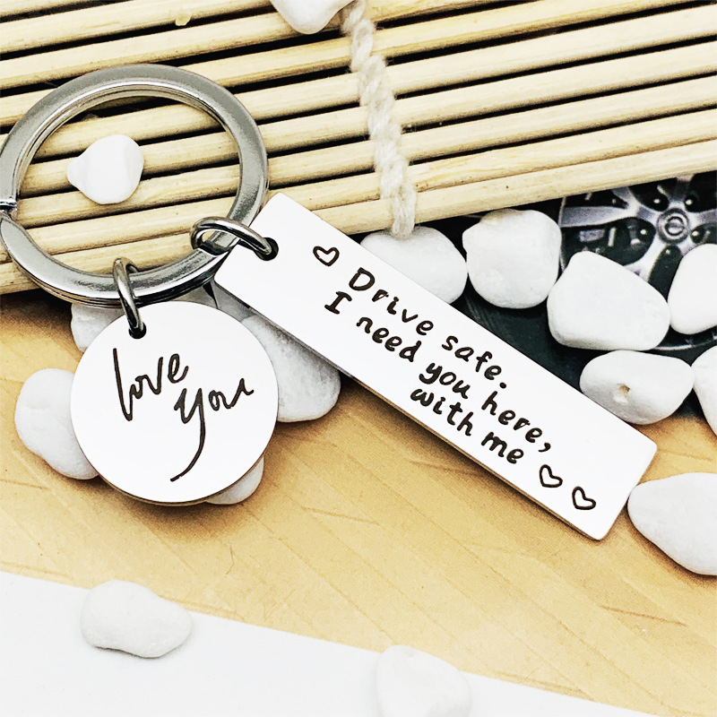 Drive Safe te necesito aquí conmigo buena conducción de acero inoxidable llavero al por mayor