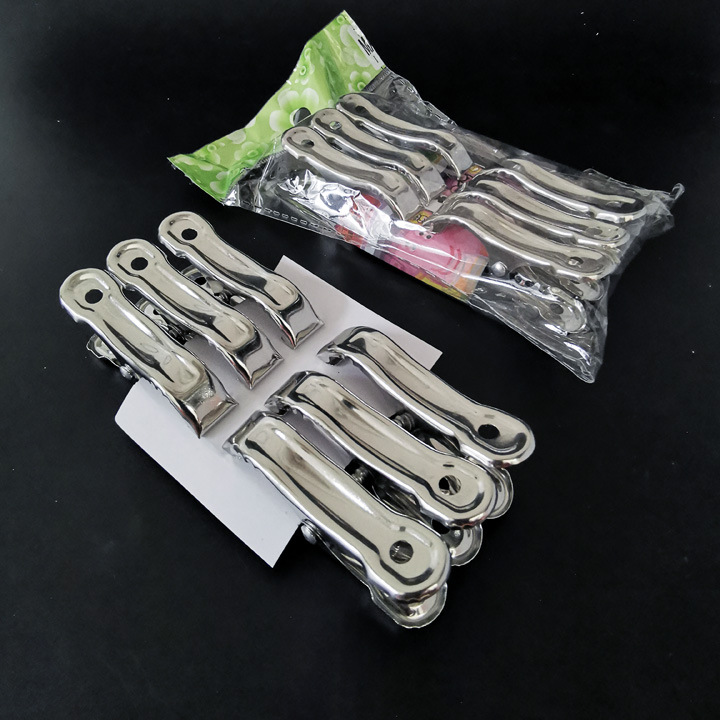 L2342 5cm paquete de seis pequeño edredón clip a prueba de viento clip percha pantalones clip secado calcetines clip Yiwu 2 yuanes tienda al por mayor