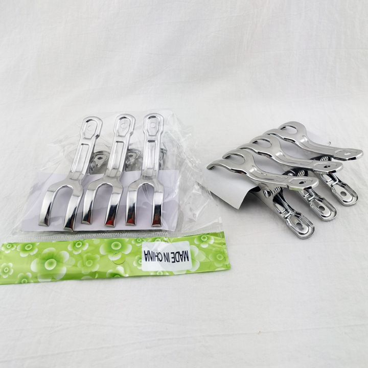 L2442 8,5 cm tres pequeño clip abierto clip de ropa multifuncional calcetines de secado clip de aire 2 yuanes tienda