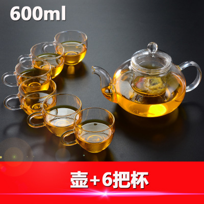 Los fabricantes suministran cuatro estaciones tetera de vidrio borosilicato tetera transparente Kung Fu juego de té traje