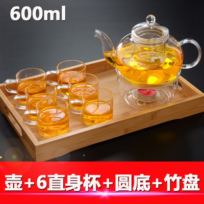 Los fabricantes suministran cuatro estaciones tetera de vidrio borosilicato tetera transparente Kung Fu juego de té traje