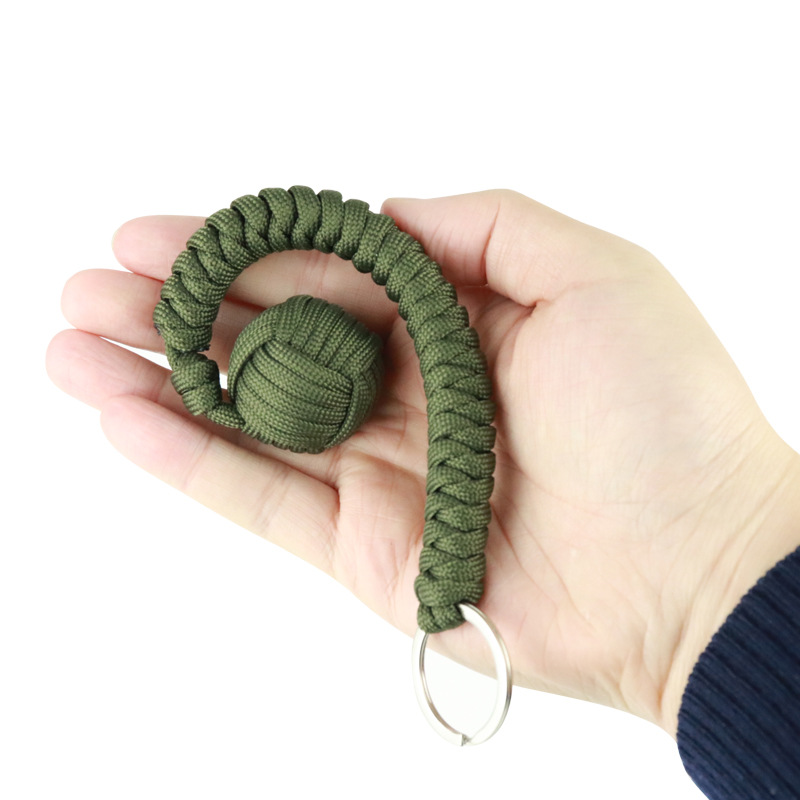 550 cuerda de paraguas montañismo supervivencia autodefensa bola de acero al aire libre nudo de diamante tejido autodefensa Bola de boxeo mono llavero redondo