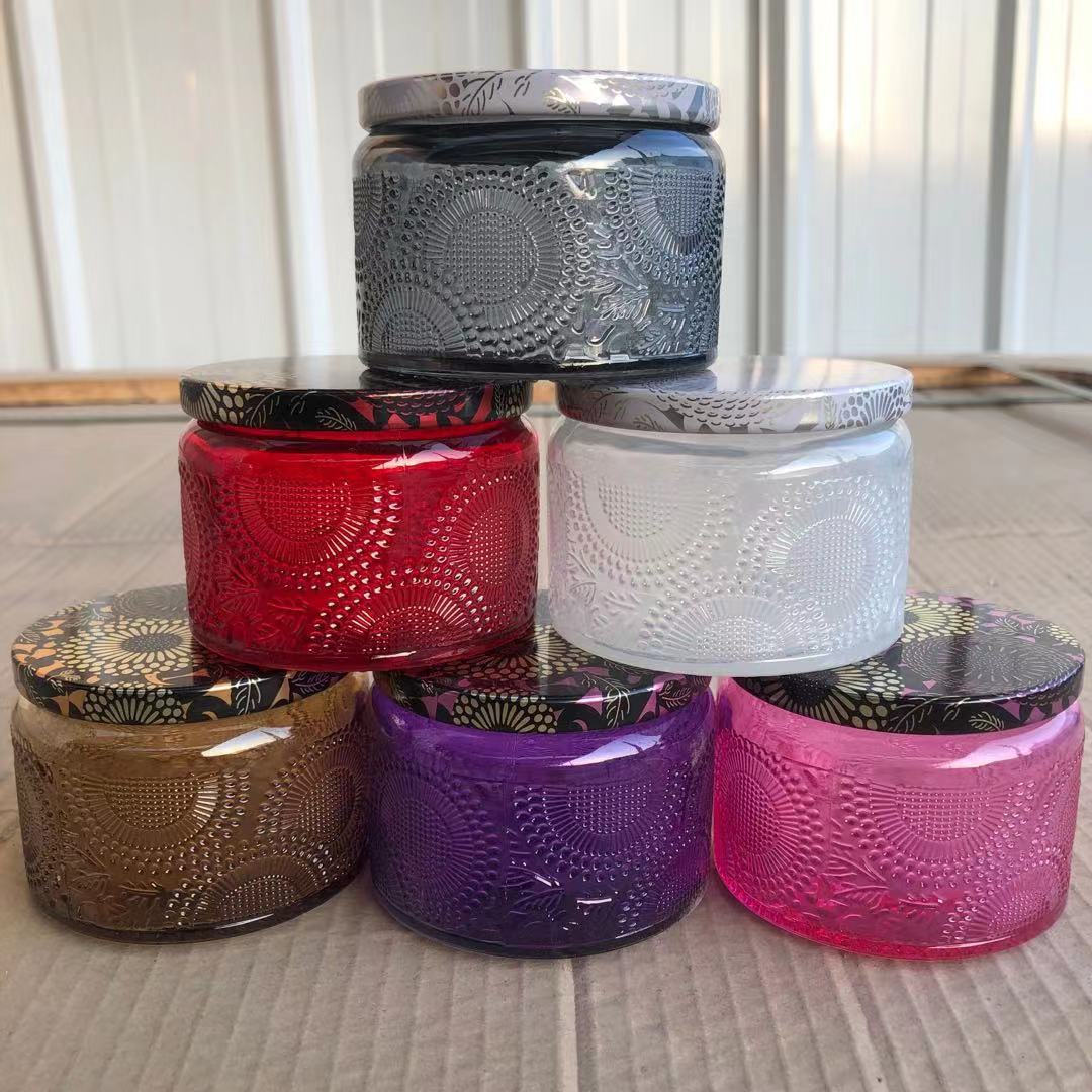 Fragancia para el hogar pequeña taza de vela en relieve de color con tapa botella de vela de vidrio de bricolaje recipiente de vela botella transparente