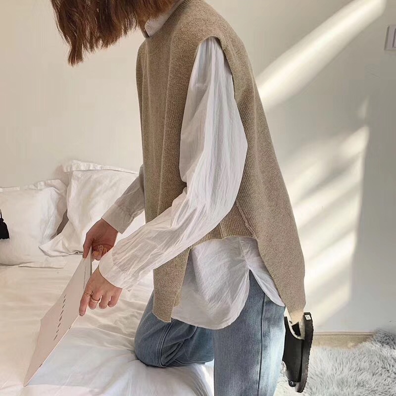 2023 Otoño e Invierno transfronterizo Chaleco de punto de mujer estilo coreano cuello redondo suéter suelto suéter sin mangas entrega de una pieza