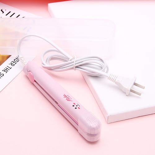 Small household mini portable hard candy sealing machine snack snowflake candy packaging bag sugar paper plastic sealing machine small clapboard