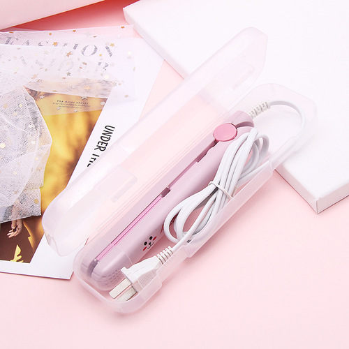 Small household mini portable hard candy sealing machine snack snowflake candy packaging bag sugar paper plastic sealing machine small clapboard
