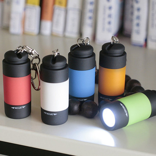 USB rechargeable led multifunctional bright light children's household plastic small flashlight portable mini flashlight
