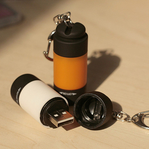 USB rechargeable led multifunctional bright light children's household plastic small flashlight portable mini flashlight
