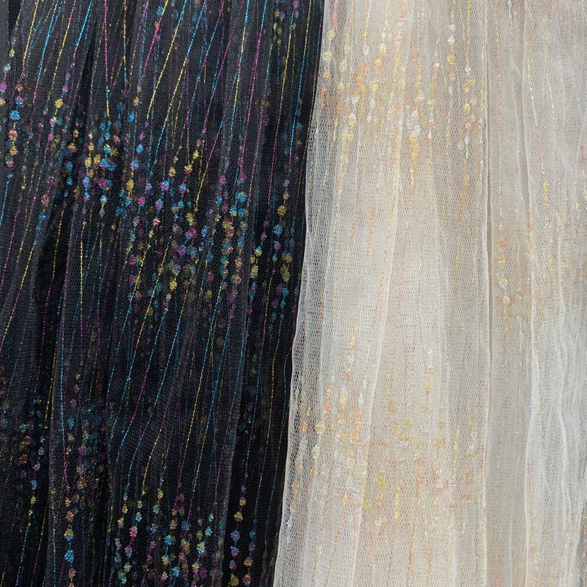 Nueva tela de malla jacquard no elástica de nylon de colores con cuentas de malla de hadas que basa la tela de la ropa de los niños en stock al por mayor
