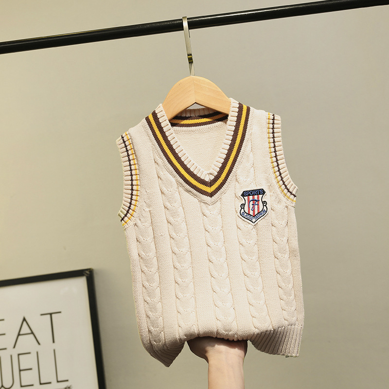 라벨이있는 아이보리 조끼